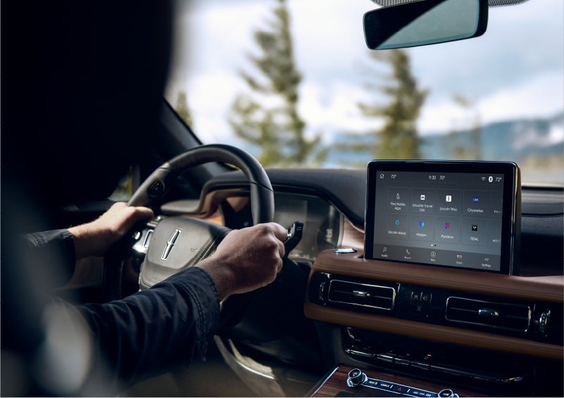 The Lincoln+Alexa app screen is displayed in the center screen of a 2023 Lincoln Aviator® Grand Touring SUV | Cogswell Lincoln in Russellville AR