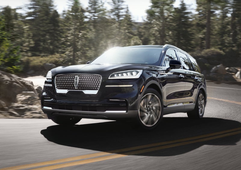 A Lincoln Aviator® SUV is being driven on a winding mountain road | Cogswell Lincoln in Russellville AR