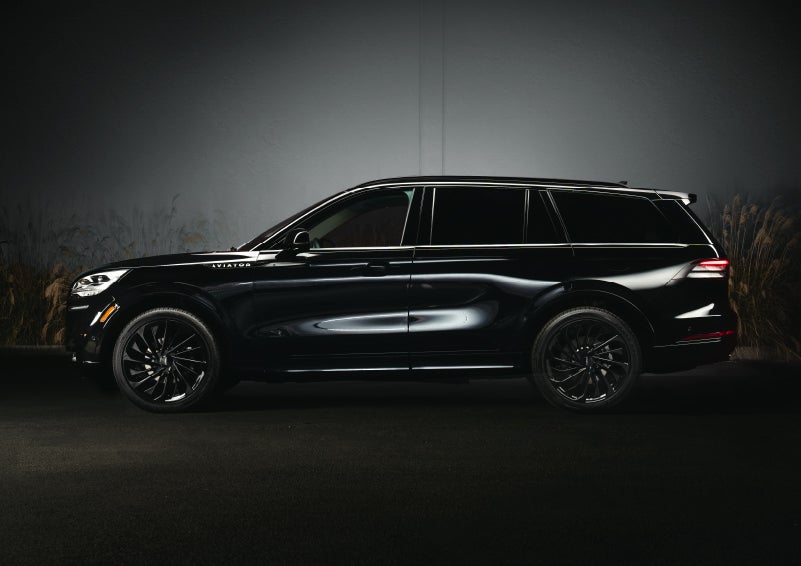 A 2024 Lincoln Aviator® SUV is shown in the Infinite Black exterior color | Cogswell Lincoln in Russellville AR