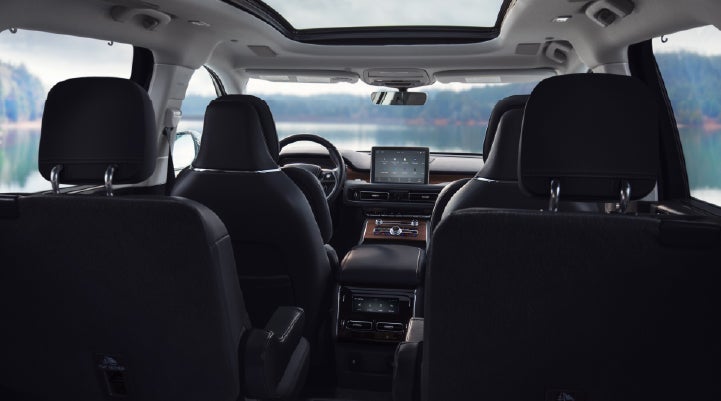 The interior of a 2024 Lincoln Aviator® SUV from behind the second row | Cogswell Lincoln in Russellville AR