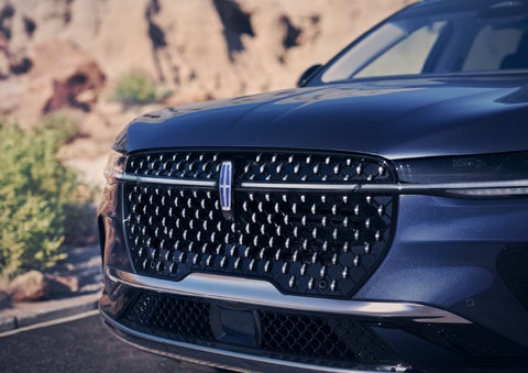 The stylish grille of a 2024 Lincoln Nautilus® SUV sparkles in the sunlight. | Cogswell Lincoln in Russellville AR